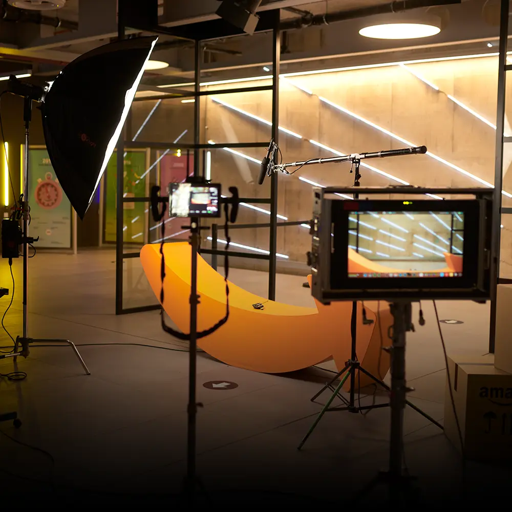 A professional film and video production setup on location at an Amazon office.