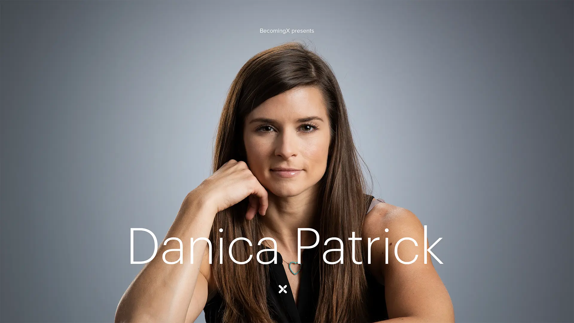 Portrait of Danica Patrick, IndyCar champion and world's most famous female racing driver. Danica Patrick text overlaid.