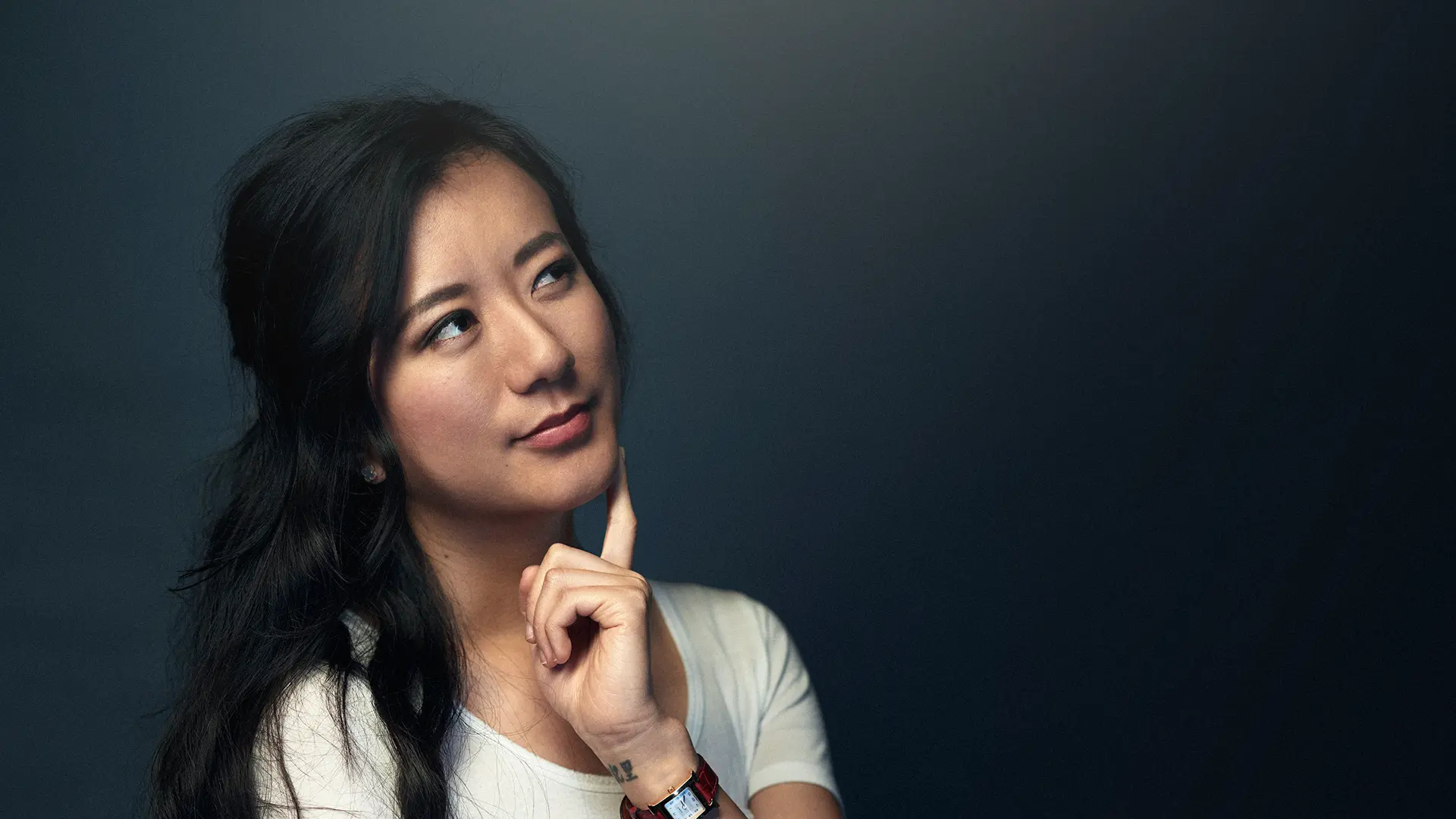 Nanxi Liu, engineer and entrepreneur, looking upward thoughtfully.