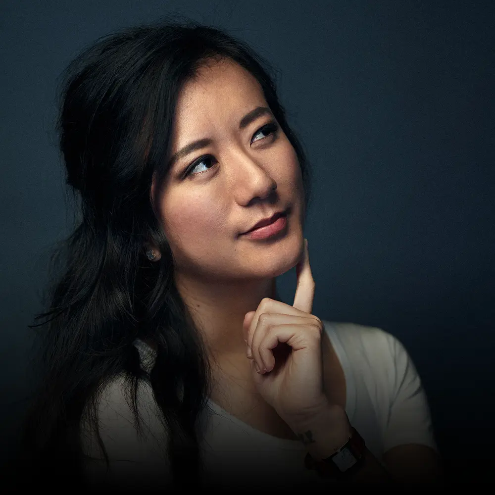 Nanxi Liu, engineer and entrepreneur, looking upward thoughtfully.
